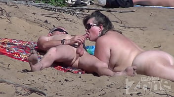 Blowjob on a nudist coast