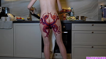 Naked housewife with octopus tattoo on ass cooks dinner on scullery and ignores you