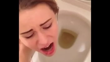 Hot brunette teen floosie swallows boyfriends piss drop toilet