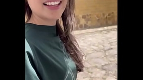 Two lesbians touch each other to orgasm on the corner of a town trying to avoid being seen by anyone