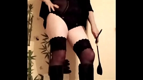 2025 02 19 Mistress K in bodysuit and stockings, heels, dominates her slave