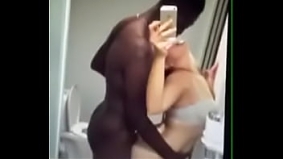 White woman records herself with a black dick