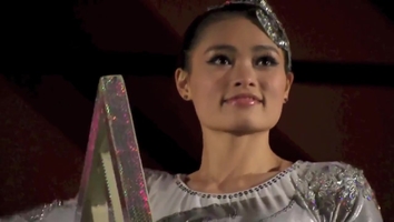 GORGEOUS CHINESE GIRL PERFORMING DEFYING STUNT