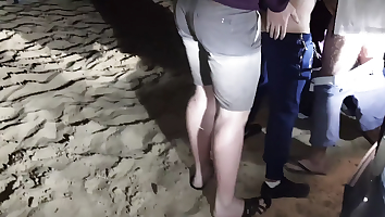 Sucking a stranger's dick on the beach.
